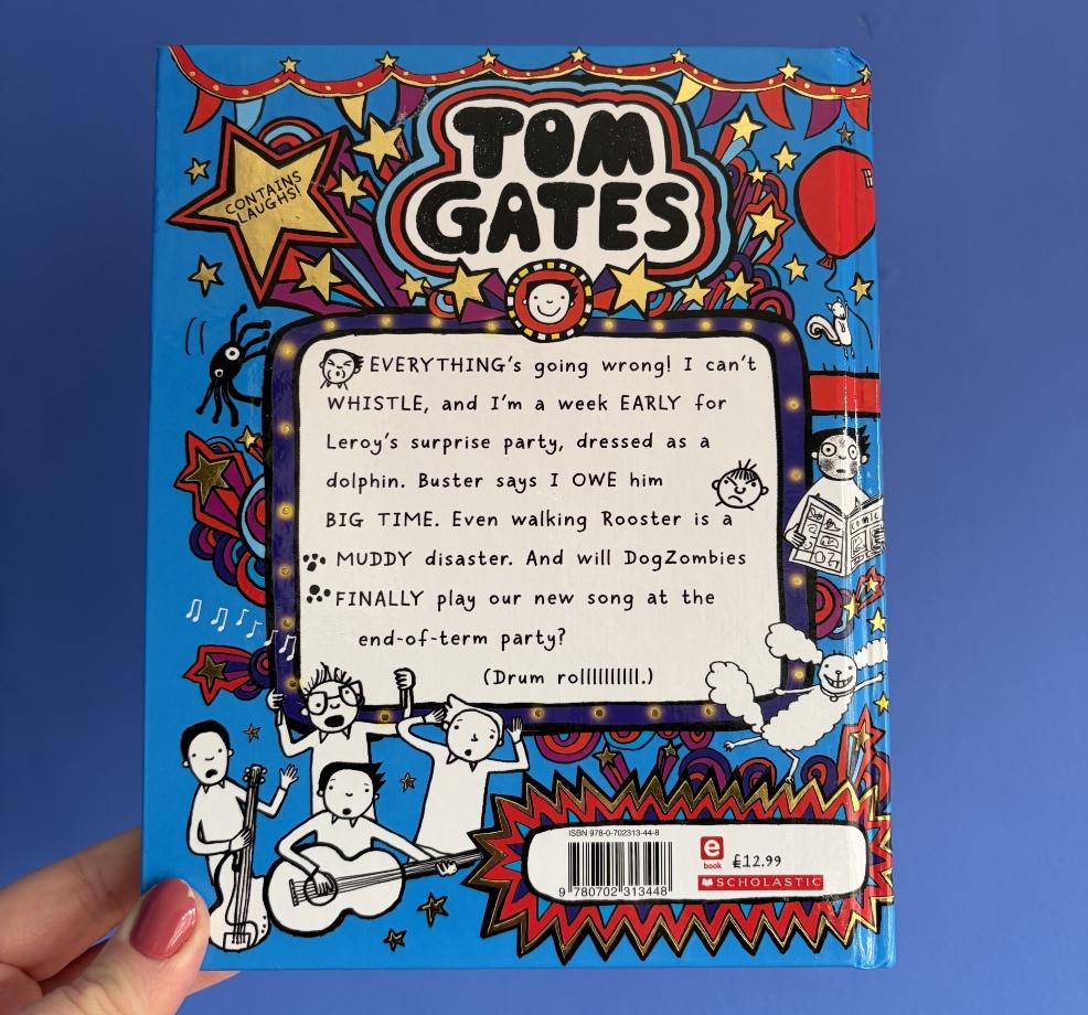 the back cover of Tom Gates Pesky Pets and Parties book for a book review picture of the back cover of Tom Gates Pesky Pets and Parties book for a book review