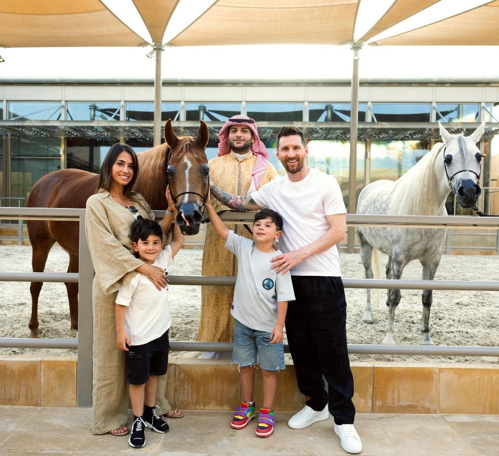 picture of Messi and family interacting with magnificent purebred Arabian horses in Saudi