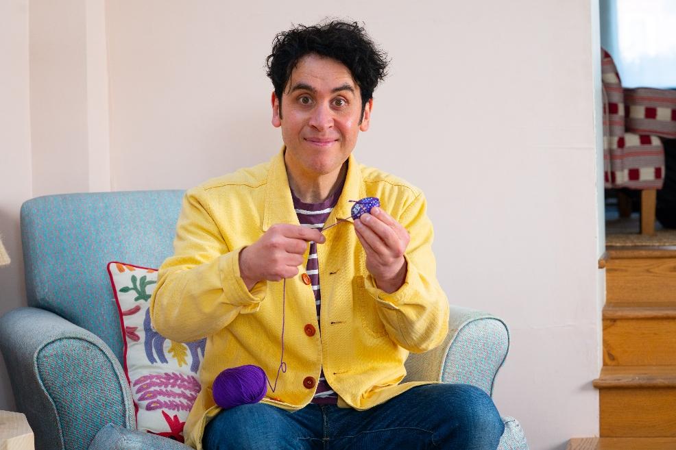 picture of magician Pete Firman hiding cadburys easter eggs to make easter egg hunt more fun