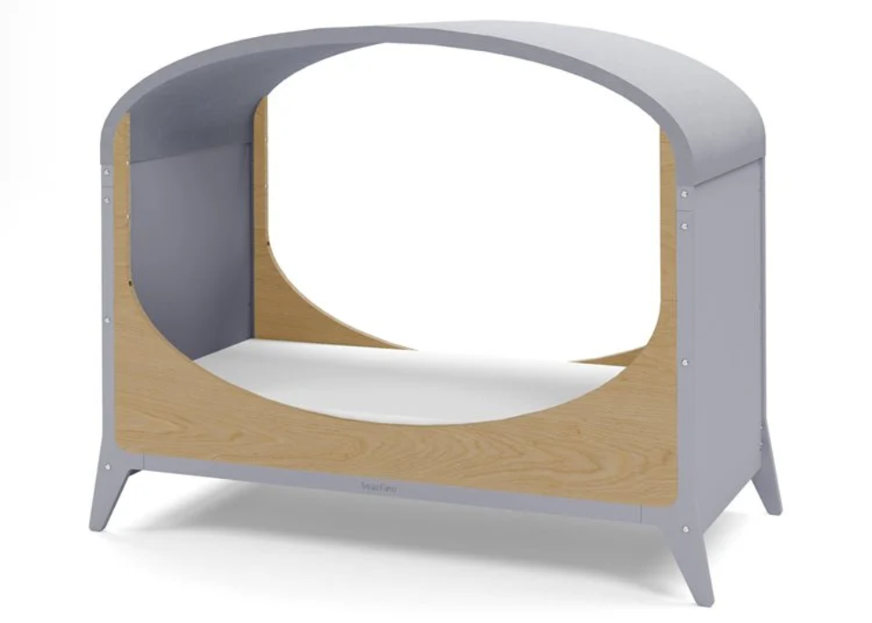 picture of child in SnüzFino Cot bed