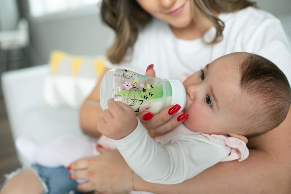 picture of a baby with a Dr Browns animal themed bottles