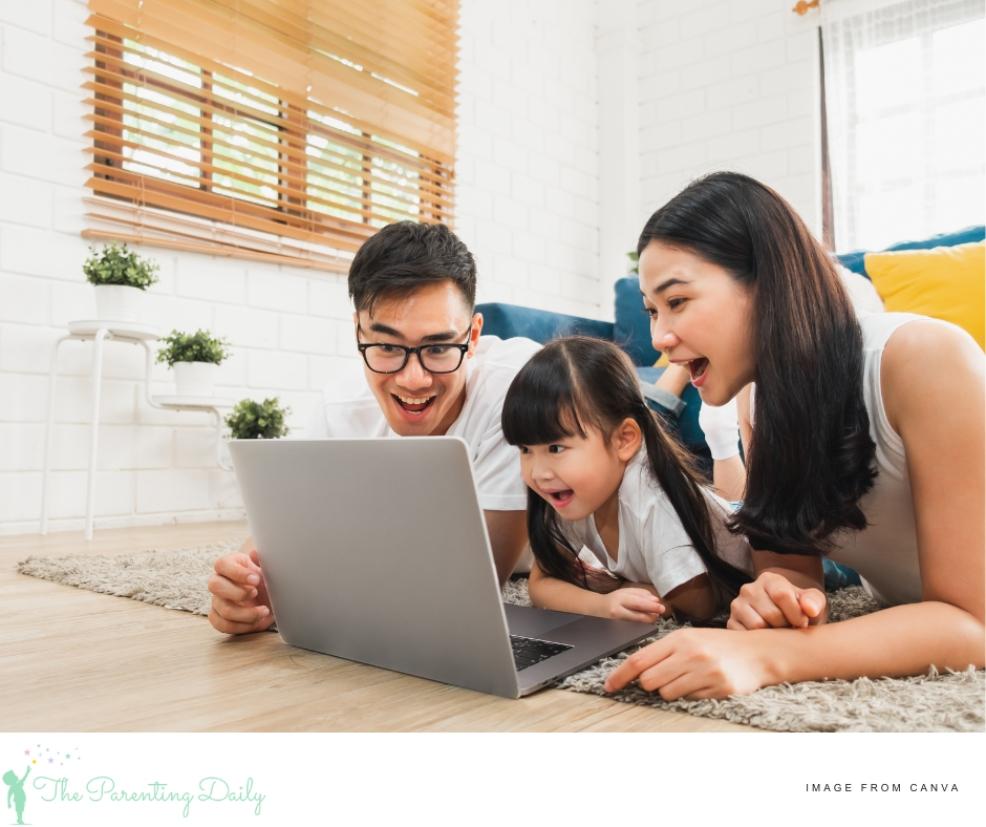 a happy family using a laptop together picture of a happy family using a laptop together