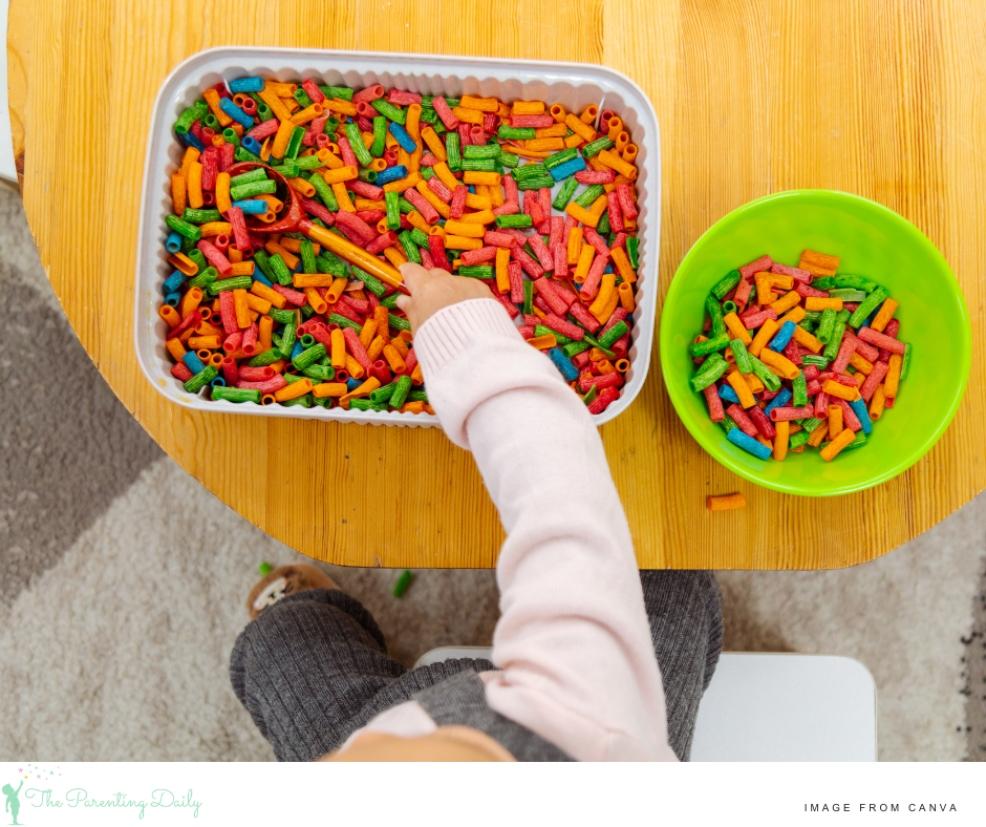 picture of brightly coloured dyed pasta for a toddler sensory play activity