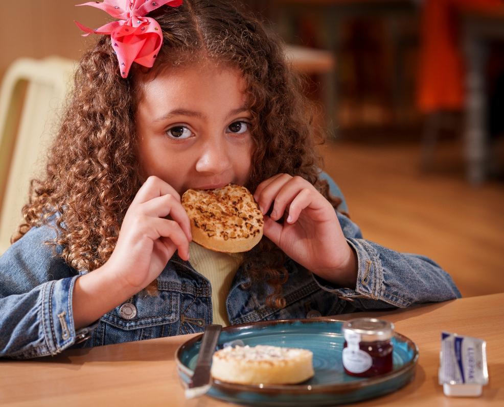 picture of a child having free crumpet at Morrisons cafe