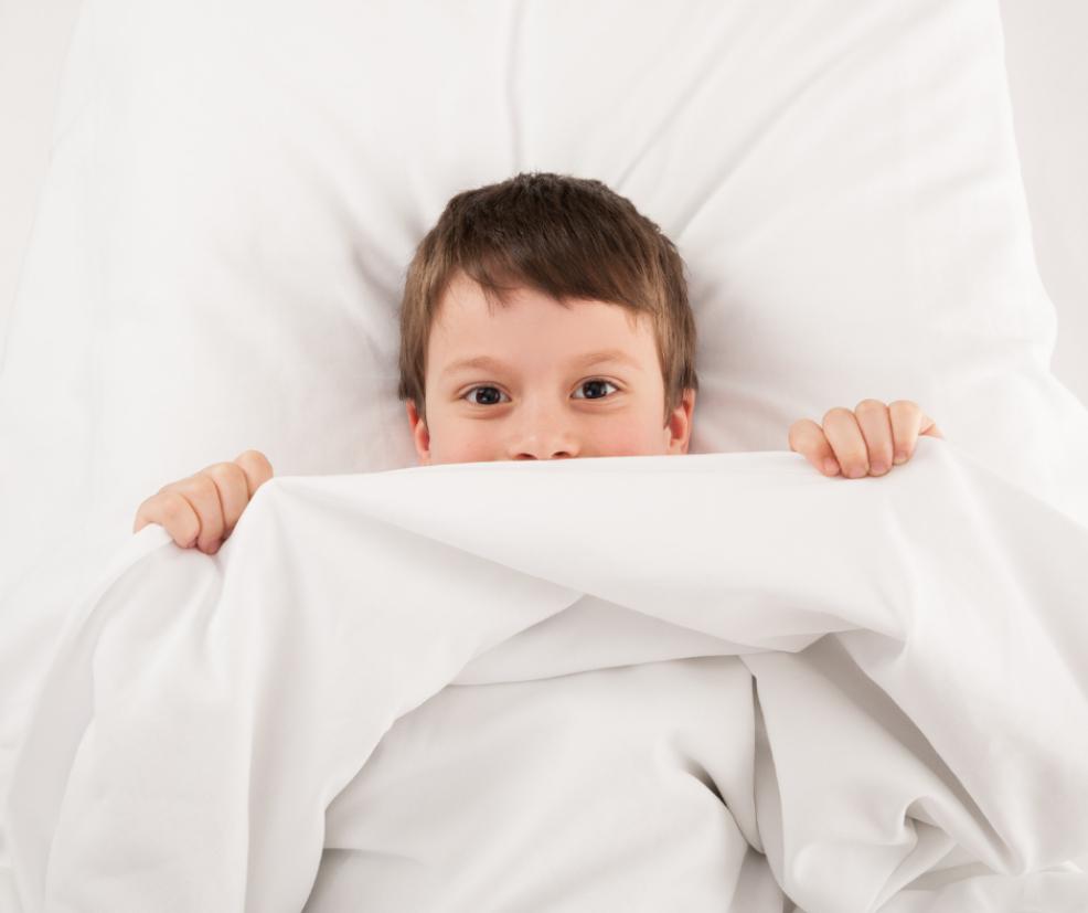 picture of a child in bed