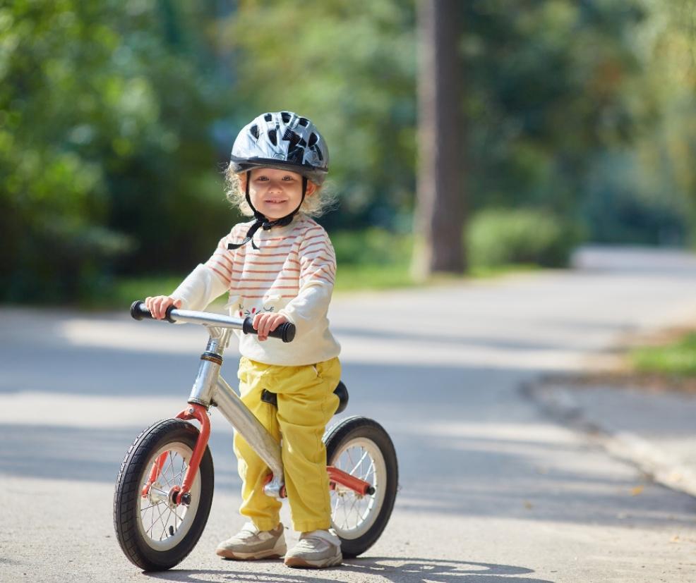 picture of a child on a balance bike