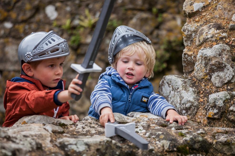 picture of kids roleplaying at castle ruins