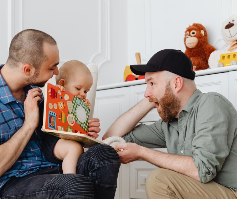 picture of dads reading to a toddler