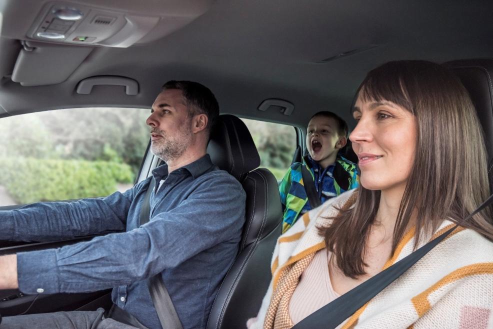 picture of a family in a skoda car with children arguing in the back