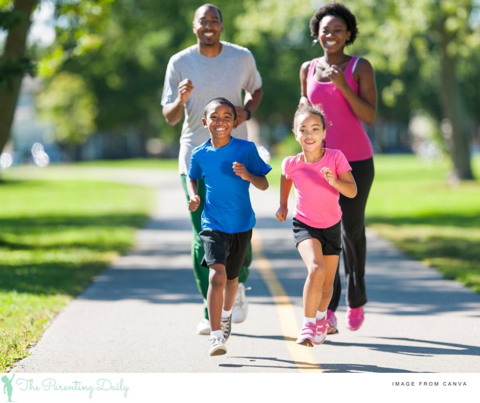 picture of a family running together in the sunshine