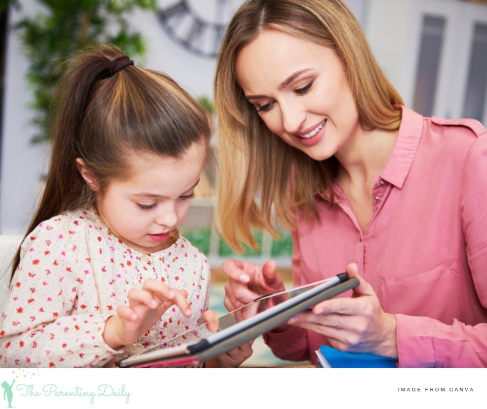 parent and child using a smart device together picture of a parent and child using a smart device together