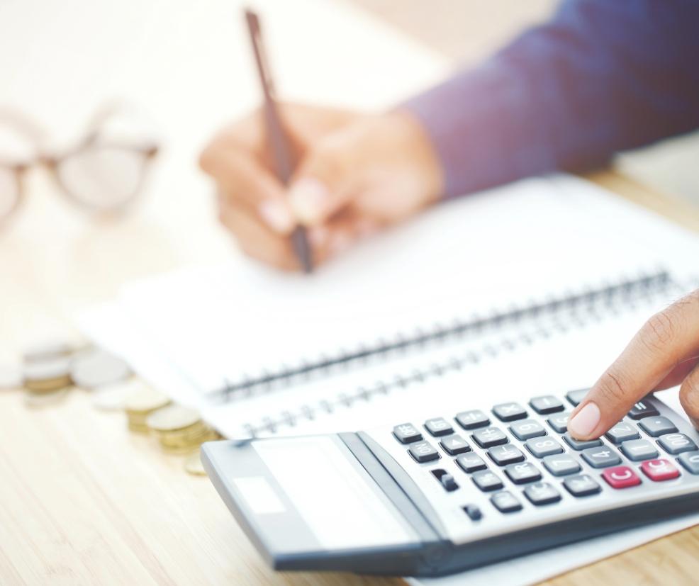 picture of a person working out a budget