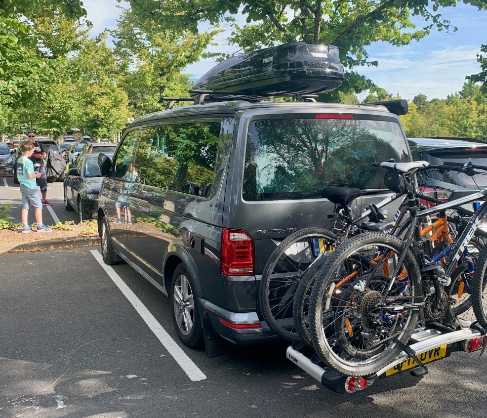 picture of a vw camper with bikes on the back