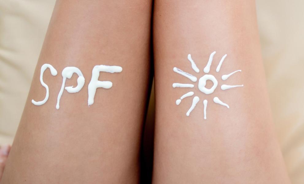 picture of the word spf written in suncream