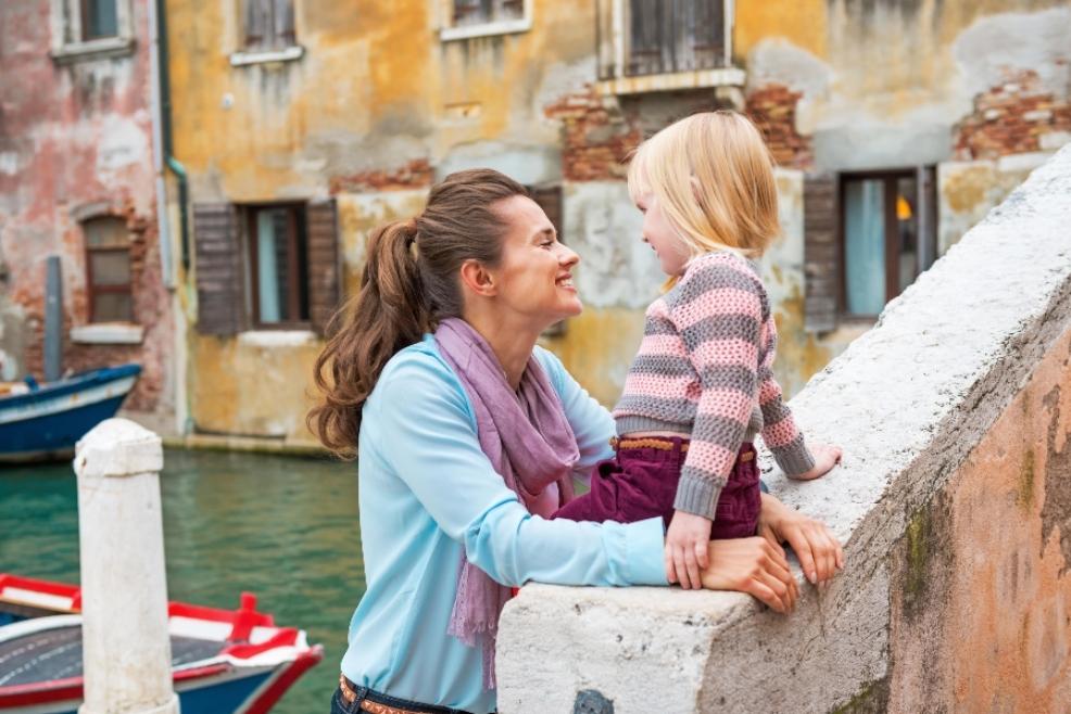 picture of mother and child smiling at eachother in Italy