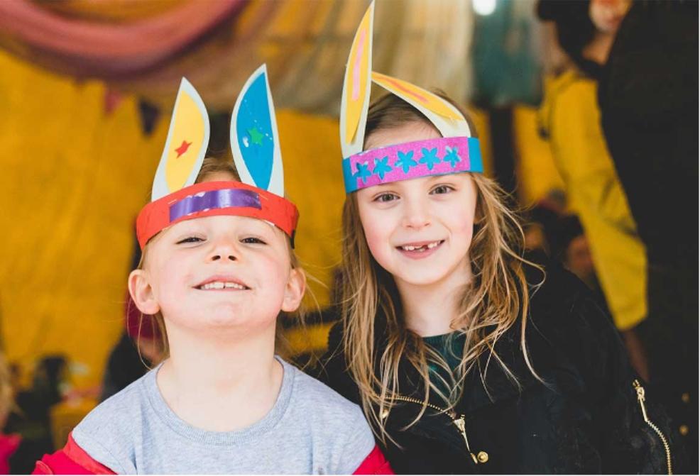 picture of children wearing easter hats