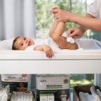 a baby having their nappy changed with naty baby wipes picture of a baby having their nappy changed with naty baby wipes