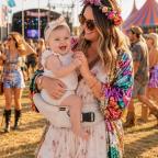 a happy mum and baby using the Hackerlily hipsurfer at a Festival picture of a happy mum and baby using the Hackerlily hipsurfer at a Festival