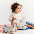 picture of a toddler using Mo and Marine Sensitive Wipes