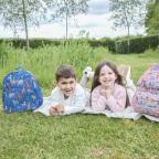 happy children with personalised school backpacks from my first years picture of happy children with personalised school backpacks from my first years