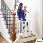 mum and baby using Fred Pressure Fit Wooden Stairgate at home picture of mum and baby using Fred Pressure Fit Wooden Stairgate at home