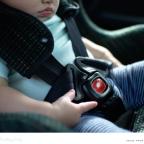 picture of a close up picture of a child in a rear facing car seat