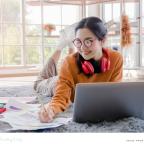 picture of a happy teen following exam revision tips to make a levels less stressful