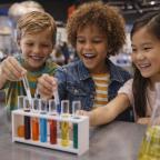 picture of children exploring science experiments at a museum