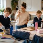a relaxed family getting ready for school on a busy morning picture of a relaxed family getting ready for school on a busy morning