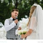 a groom giving a speech to his wife on their wedding day picture of a groom giving a speech to his wife on their wedding day