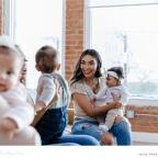 a happy mum and baby interacting at a mother and baby group picture of a happy mum and baby interacting at a mother and baby group