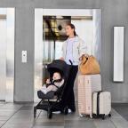 a mum and baby travelling using the Pisces Ultra Compact Stroller picture of a mum and baby travelling using the Pisces Ultra Compact Stroller