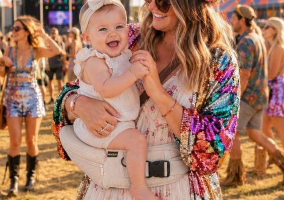 a happy mum and baby using the Hackerlily hipsurfer at a Festival picture of a happy mum and baby using the Hackerlily hipsurfer at a Festival
