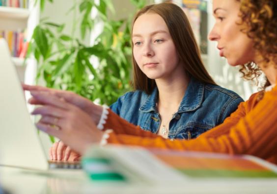 picture of a parent helping prepare her child for sixth form