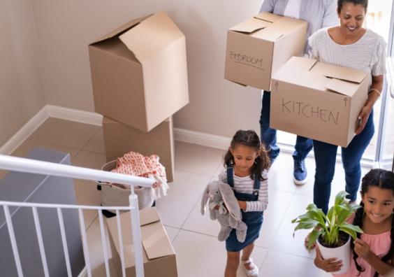picture of a happy family moving house