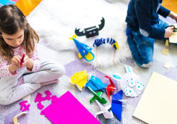 picture of children doing arts and crafts inside on a rainy day