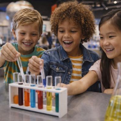 picture of children exploring science experiments at a museum