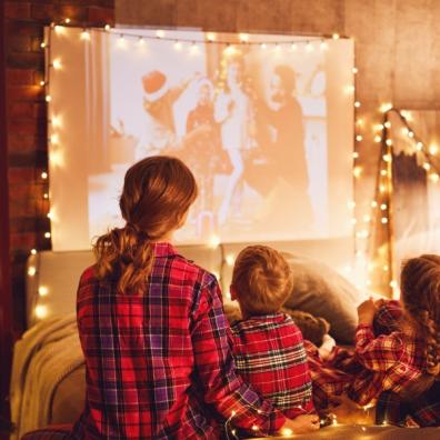 picture of a family watching a Christmas film