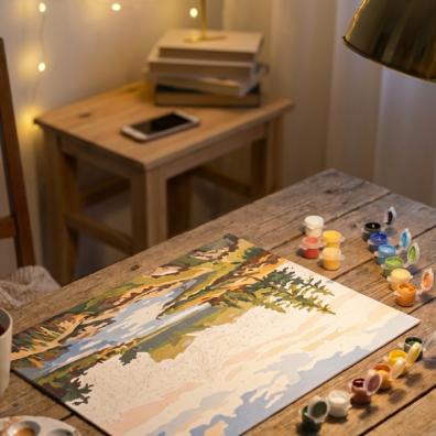 picture of a warm inviting scene of a digital detox evening with paint by numbers