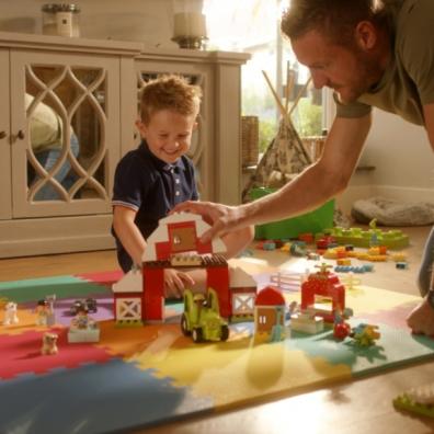 Picture of Jamie Vardy playing with lego with a child for celebrate like a pro campaign