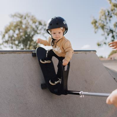 picture of a toddler on a skateboard