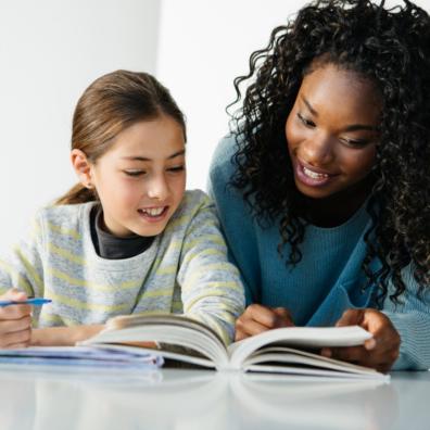picture of a Tutor working with a child