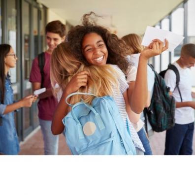Picture of girls celebrating exam results in school corridor 