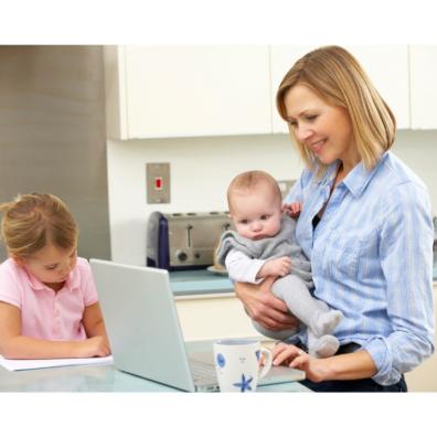 Picture of a mum on a laptop with her children in the kitchen