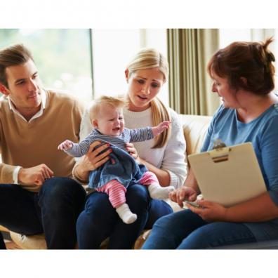 Picture of a family with a family support worker