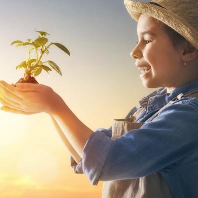 Picture of a happy eco child holiday a tree