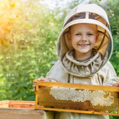 Picture of a child beekeeper