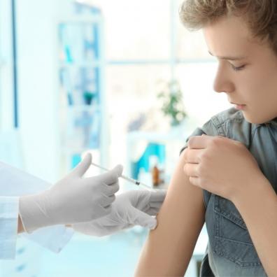 Picture of a 12-15 year old getting a vaccine