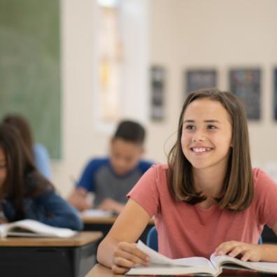 picture of multicultural children learning in a classroom