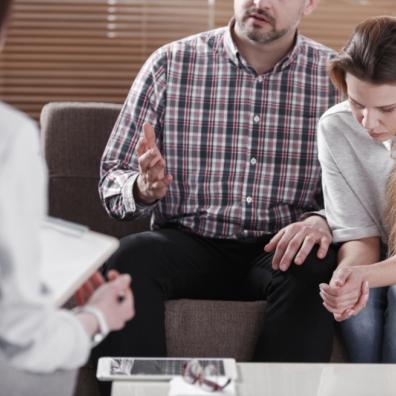 picture of an unhappy couple having mediation